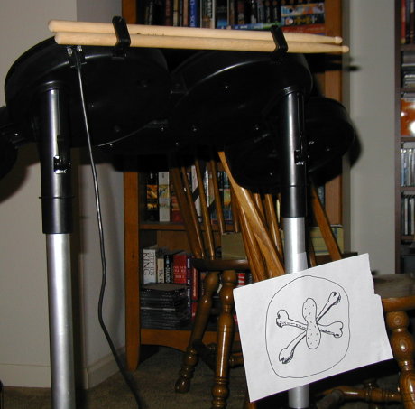 drum set with peanut and crossbones logo